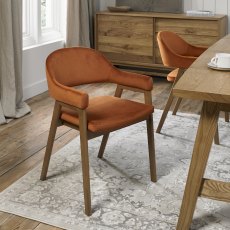 Camden Rustic Oak Upholstered Arm Chair in a Rust Velvet Fabric (Pair)