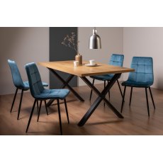 Ramsay Rustic Oak Effect Melamine 6 Seater Dining Table with X Leg  & 4 Mondrian Petrol Blue Velvet Fabric Chairs with Sand Black Powder Coated Legs
