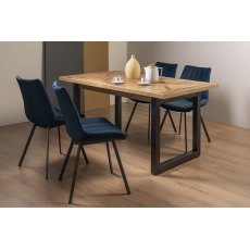 Indus Rustic Oak 4-6 Seater Dining Table with Peppercorn Legs & 4 Fontana Blue Velvet Fabric Chairs with Grey Hand Brushing on Black Powder Coated Legs