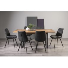 Indus Rustic Oak 6-8 Seater Dining Table with Peppercorn Legs & 6 Fontana Dark Grey Faux Suede Fabric Chairs with Grey Hand Brushing on Black Powder Coated Legs