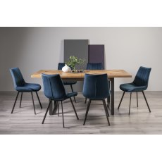 Indus Rustic Oak 6-8 Seater Dining Table with Peppercorn Legs & 6 Fontana Blue Velvet Fabric Chairs with Grey Hand Brushing on Black Powder Coated Legs