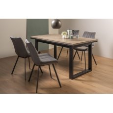 Tivoli Weathered Oak 4-6 Seater Dining Table with Peppercorn Legs  & 4 Fontana Grey Velvet Fabric Chairs with Grey Hand Brushing on Black Powder Coated Legs
