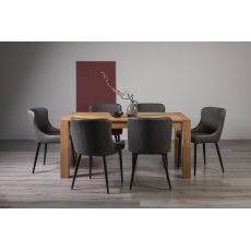 Turin Light Oak 6 Seater Dining Table & 6 Cezanne Dark Grey Faux Leather Chairs with Sand Black Powder Coated Legs