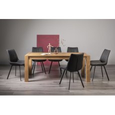 Turin Light Oak 6-10 Seater Dining Table & 8 Fontana Dark Grey Faux Suede Fabric Chairs with Grey Hand Brushing on Black Powder Coated Legs
