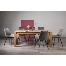 Turin Light Oak 6-10 Seater Dining Table & 8 Fontana Grey Velvet Fabric Chairs with Grey Hand Brushing on Black Powder Coated Legs