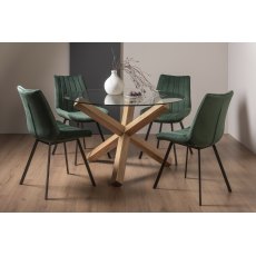 Turin Clear Tempered Glass 4 Seater Dining Table with Light Oak Legs & 4 Fontana Green Velvet Fabric Chairs with Grey Hand Brushing on Black Powder Coated Legs