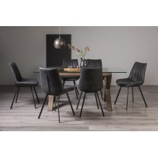 Turin Clear Tempered Glass 6 Seater Dining Table with Dark Oak Legs & 6 Fontana Dark Grey Faux Suede Fabric Chairs with Grey Hand Brushing on Black Powder Coated Legs