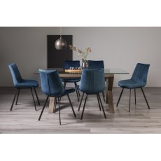 Turin Clear Tempered Glass 6 Seater Dining Table with Dark Oak Legs & 6 Fontana Blue Velvet Fabric Chairs with Grey Hand Brushing on Black Powder Coated Legs