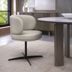 Marcel - 360° Swivel Chair in a Ivory Faux Leather with Black Legs (Pair)