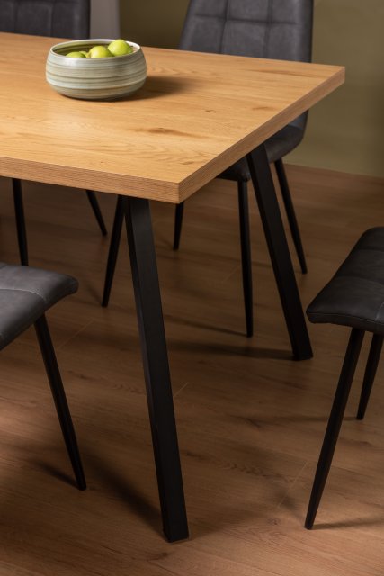 Gallery Collection Ramsay Rustic Oak Effect Melamine 6 Seater Dining Table with 4 Sand Black Powder Coated Legs