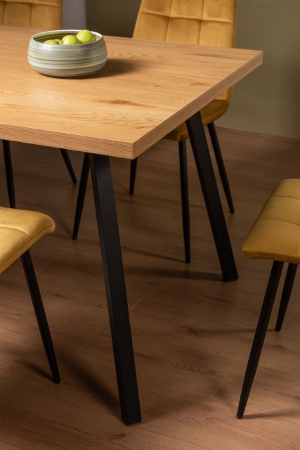 Gallery Collection Ramsay Oak Melamine 6 Seater Dining Table with 4 Black Legs Dining Tables Bentley Designs UK Ltd