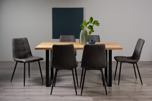 Gallery Collection Ramsay Rustic Oak Effect Melamine 6 Seater Dining Table with U Leg  & 6 Mondrian Dark Grey Faux Leather Chairs with Sand Black Powder Coated Legs