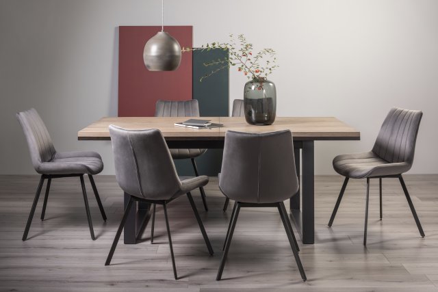 Signature Collection Tivoli Weathered Oak 6-8 Seater Dining Table with Peppercorn Legs  & 6 Fontana Grey Velvet Fabric Chairs with Grey Hand Brushing on Black Powder Coated Legs