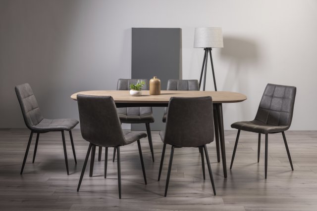 Gallery Collection Vintage Weathered Oak 6 Seater Dining Table with Peppercorn Legs & 6 Mondrian Dark Grey Faux Leather Chairs with Sand Black Powder Coated Legs
