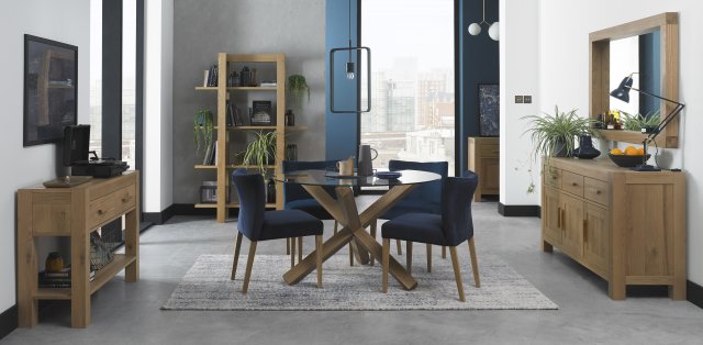 Bentley Designs Turin Light Oak 4 Seater Glass Circular Dining Set & 4 Low Back Upholstered Chairs in Dark Blue Velvet Fabric