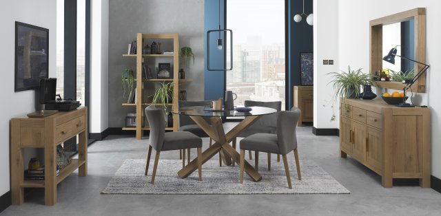 Bentley Designs Turin Light Oak 4 Seater Glass Circular Dining Set & 4 Low Back Upholstered Chairs in Gun Metal Velvet Fabric