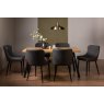 Gallery Collection Ramsay Oak Melamine 6 Seater Table - 4 Legs & 6 Cezanne Dark Grey Faux Leather Chairs - Black Legs