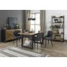 Signature Collection Indus Rustic Oak 4-6 Seater Dining Table with Peppercorn Legs & 4 Cezanne Dark Grey Faux Leather Chairs with Sand Black Powder Coated Legs