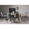 Premier Collection Turin Clear Tempered Glass 6 Seater Dining Table with Light Oak Legs & 6 Fontana Grey Velvet Fabric Chairs with Grey Hand Brushing on Black Powder Coated Legs