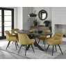 Bentley Designs Ellipse fumed oak 6 seater dining table with 6 Dali chairs- mustard velvet fabric