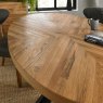 Bentley Designs Ellipse & Logan Rustic Oak 6 Seater Dining Set & 6 Uph Chairs- Dark Grey Fabric- table close up