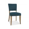 Bentley Designs Indus Rustic Oak 4 Seater Dining Set & 4 Rustic Uph Chairs- Sea Green Velvet Fabric- chair front angle