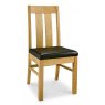 Bentley Designs Turin Light Oak 6 Seater Dining Set & 6 Slat Back Chairs Upholstered in Brown Faux Leather- chair front angle
