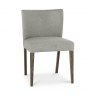 Bentley Designs Turin Dark Oak 6-10 Seater Dining Set & 8 Low Back Upholstered Chairs in Pebble Grey Fabric- chair front angl