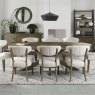 Ellipse Fumed Oak 8 Seater Dining Table with Wooden Legs